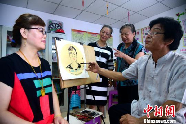 图为画像活动现场。　河北邯郸丛台区委宣传部提供　摄4_副本.jpg